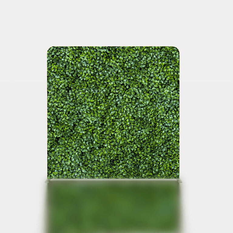 Green foliage wall backdrop option for a photo booth